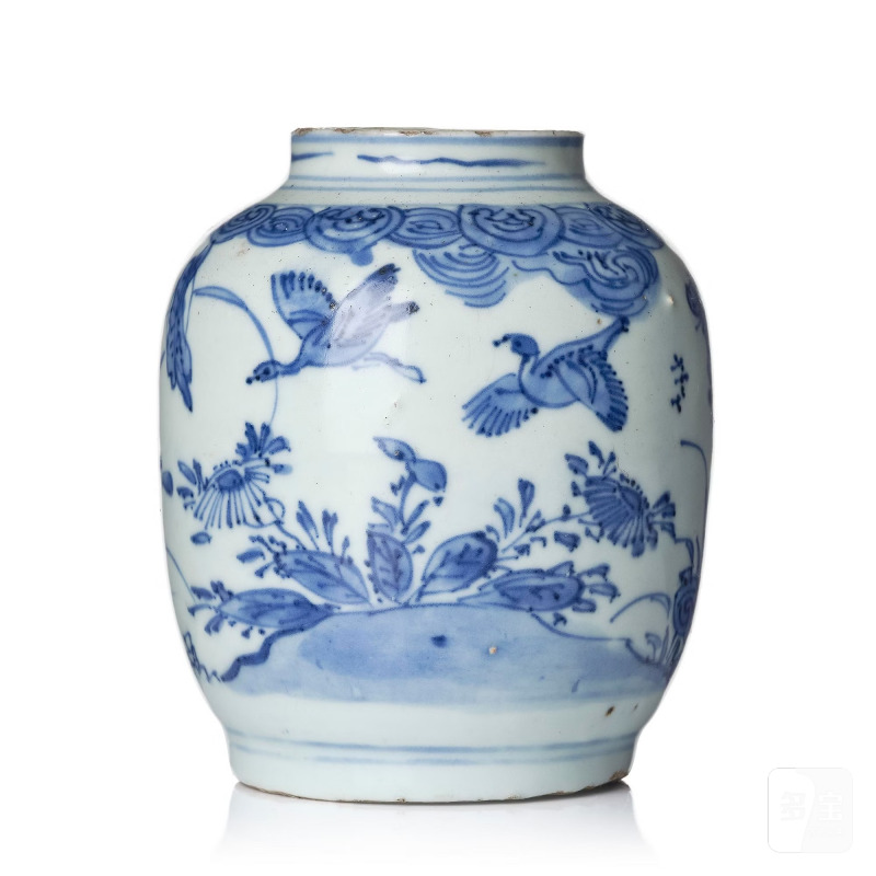 A blue and white 'geese in flight' jar,